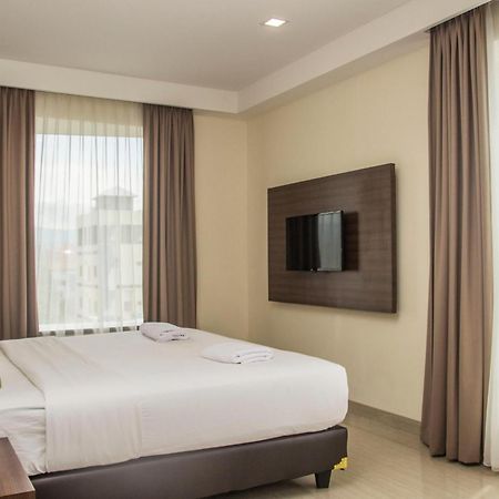 Green Eden Hotel Manado Værelse billede
