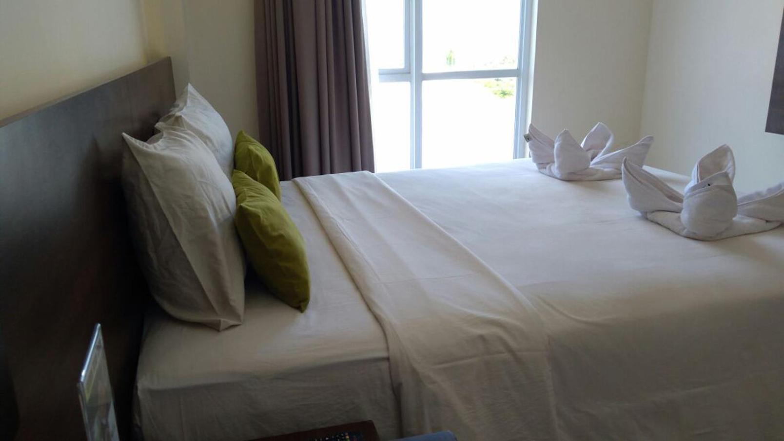 Green Eden Hotel Manado Værelse billede
