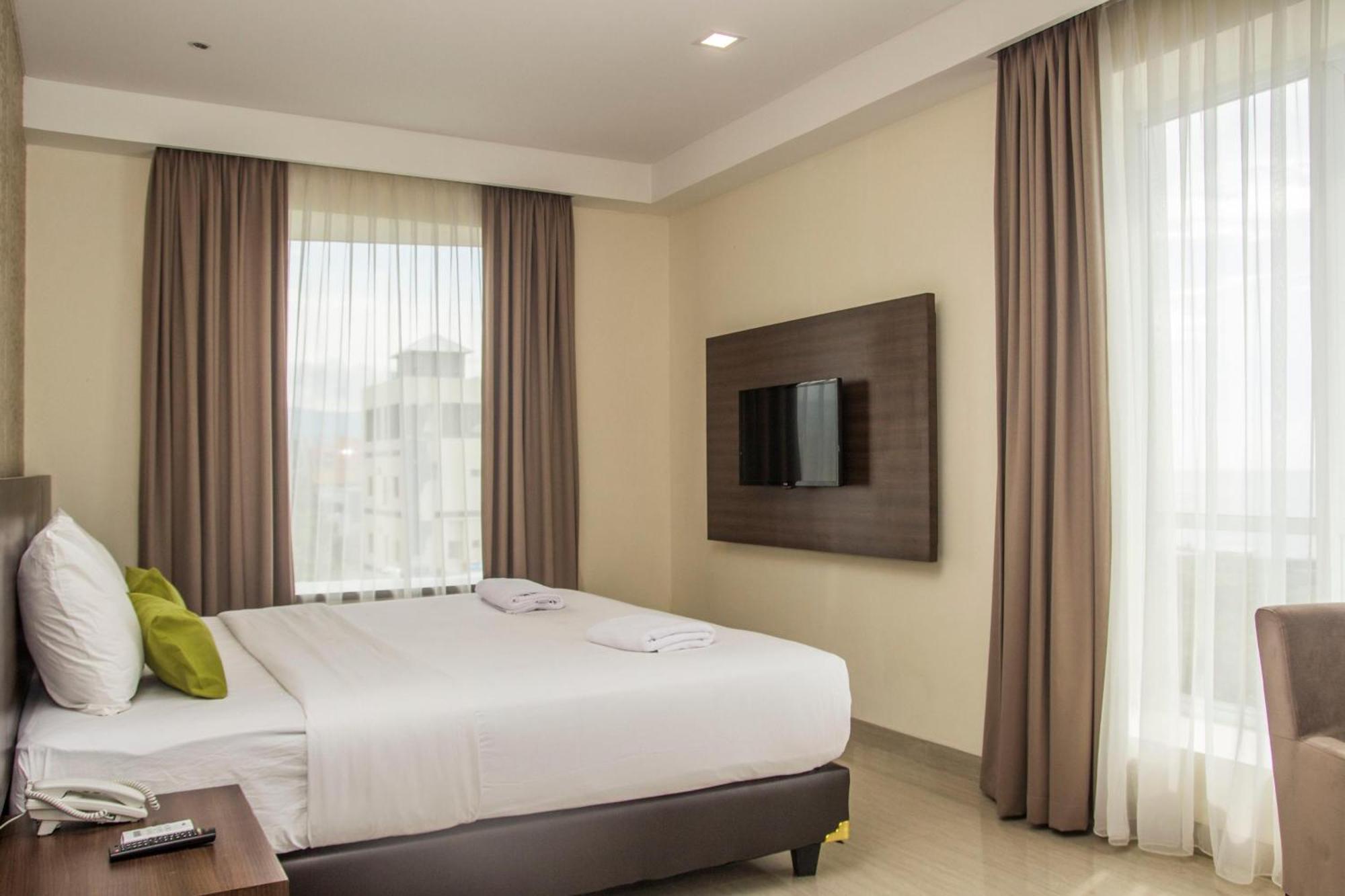 Green Eden Hotel Manado Værelse billede